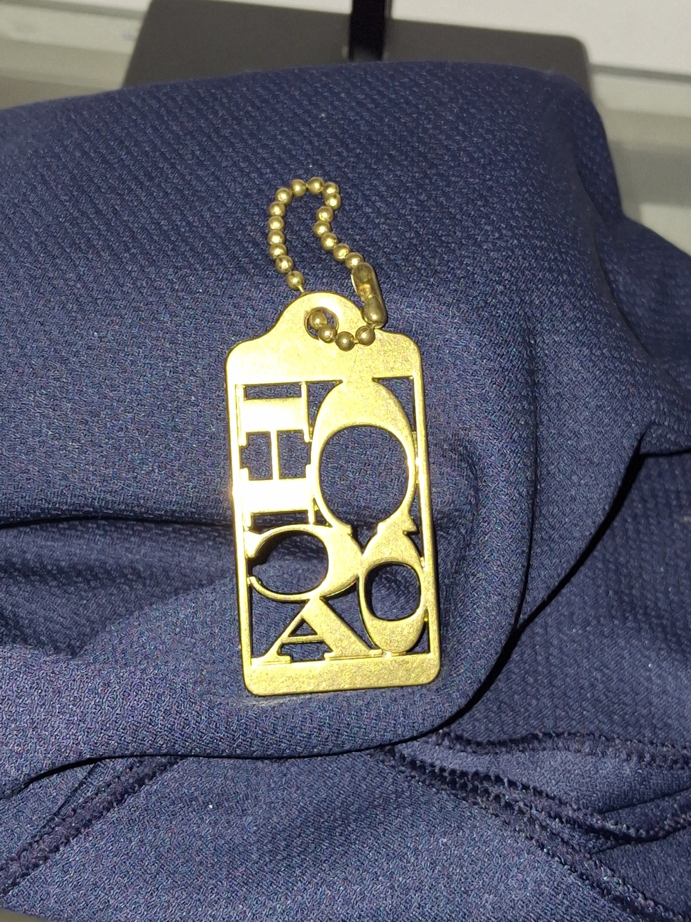 Coach Gold-Tone Cutout Logo Hangtag Charm 65th Anniversary Keychain.